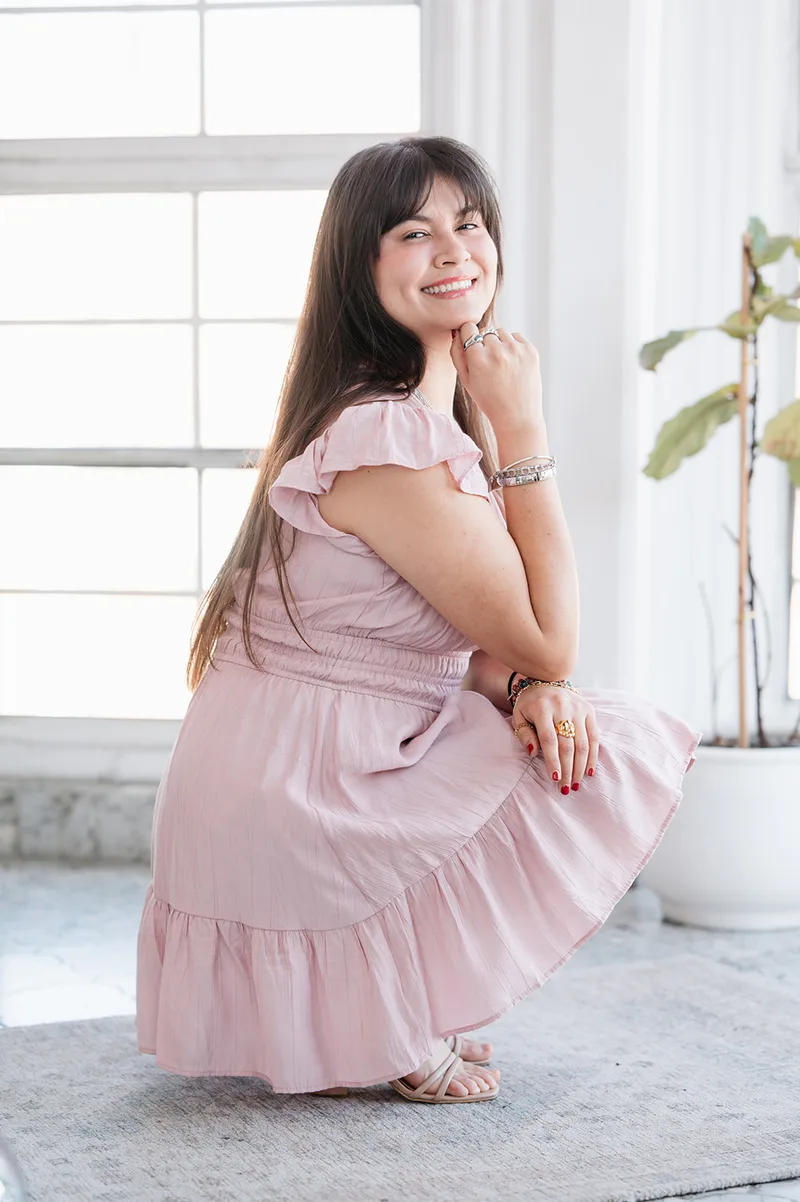 Tania Brambila sonriendo